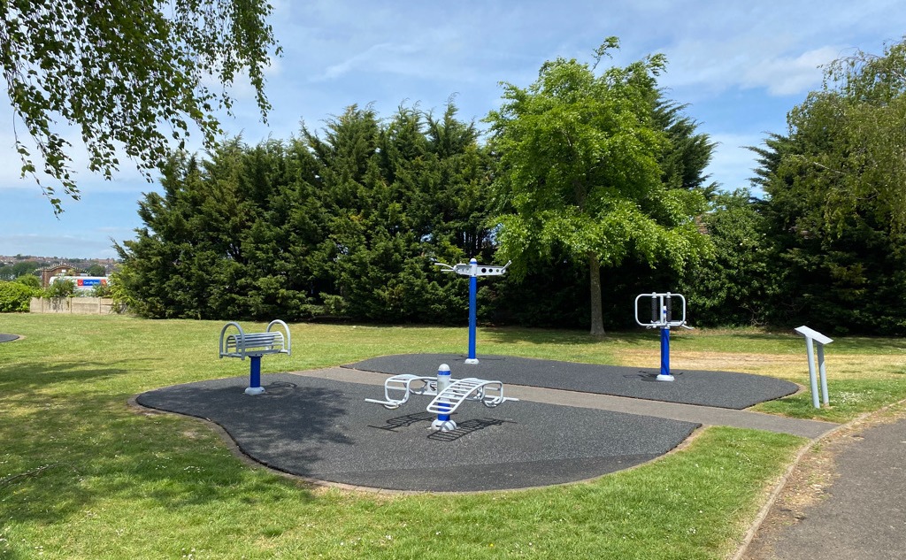 A collection of bars, supports and metal horses on a rubber-chip floor in the Esplanade Gardens