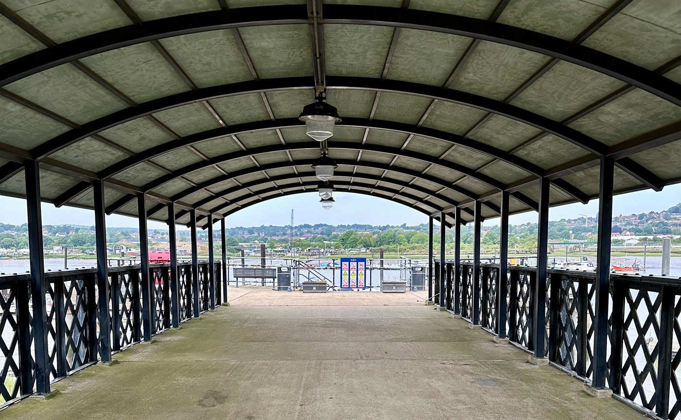 A view from the gates of Rochester Pier towards its end